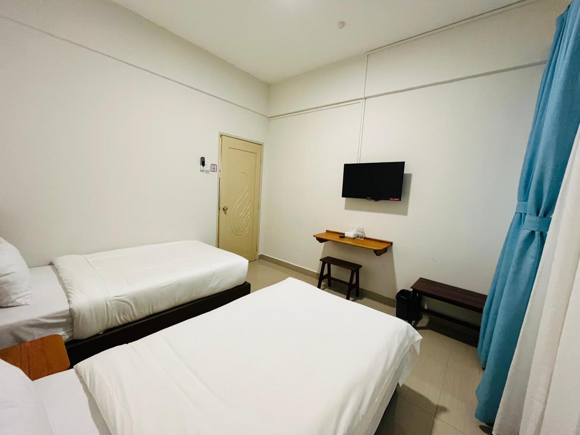 Alexis Kt Roomstay Kuala Terengganu Rum bild